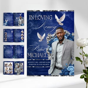May include: A memorial poster and brochures with a blue and white floral design. The poster features a photo of a man in a gray suit, the text "IN LOVING MEMORY" and the name "Robert Michael". White doves and blue roses are also featured.
