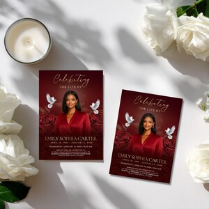 May include: Two rectangular funeral program cards featuring a deep red background with dark red roses and two white doves. Each card displays a photograph of a person in a red top, the text Celebrating the Life of Emily Sophia Carter, and service details.