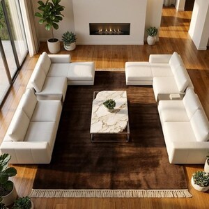 Premium chocolate brown hand-knotted rug made of 100% New Zealand wool, featuring a solid contemporary design with contrasting fringed edges, styled under a mid-century coffee table in a modern minimalist living room.