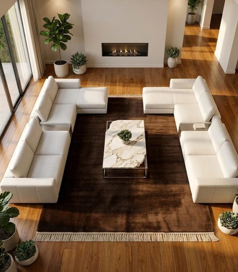 Premium chocolate brown hand-knotted rug made of 100% New Zealand wool, featuring a solid contemporary design with contrasting fringed edges, styled under a mid-century coffee table in a modern minimalist living room.