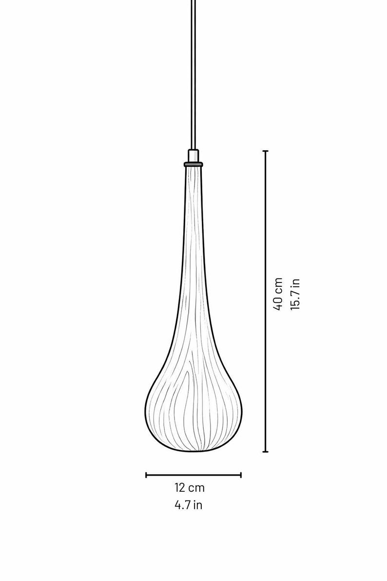 May include: A teardrop-shaped pendant light fixture with a wood grain pattern. The light is 15.7 inches (40 cm) long and 4.7 inches (12 cm) wide at its base. The fixture hangs from a thin wire.