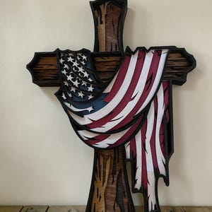Cross with draped American flag