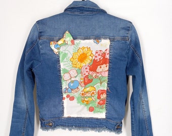 Ladies Retro Strawberry Shortcake Denim Jacket Patched Jacket Vintage Reworked Fabric Back Patch 80s Distressed Jean Trucker Jacket Upcycled