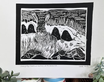 rabbit linoprint on beach on Isle of Eigg