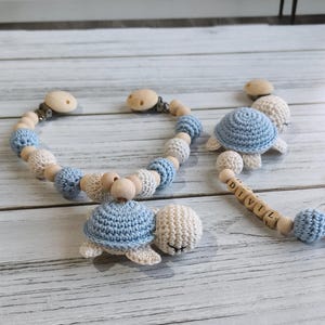 Catena per passeggino a forma di tartaruga all'uncinetto in feltro, ghirlanda per passeggino con perline di legno, set per passeggino