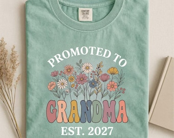 Gepromoveerd tot oma Est 2027 bloemenshirt, Comfort Colors Pregancy Reveal T-shirt
