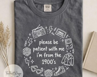 Camiseta con estampado humorístico retro de 1900, estilo vintage, colores cómodos.