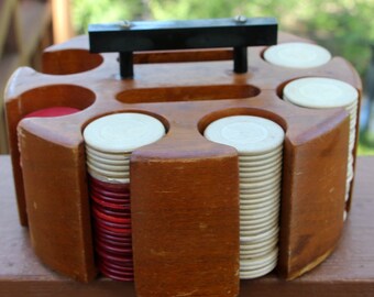 Vintage poker chips in wooden holder