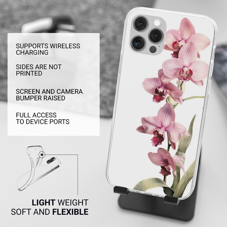 May include: Transparent phone case with a pink orchid floral design. The case has a raised screen and camera bumper and supports wireless charging. The image text reads: Supports Wireless Charging, Sides Are Not Printed, Screen and Camera Bumper Raised, Full Access to Device Ports, Light Weight, Soft and Flexible.