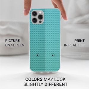 May include: A teal phone case with a textured design resembling interlocking toy bricks. The case has a clear border and a camera cutout. Text on the image reads "PICTURE ON SCREEN", "PRINT IN REAL LIFE", and "COLORS MAY LOOK SLIGHTLY DIFFERENT".