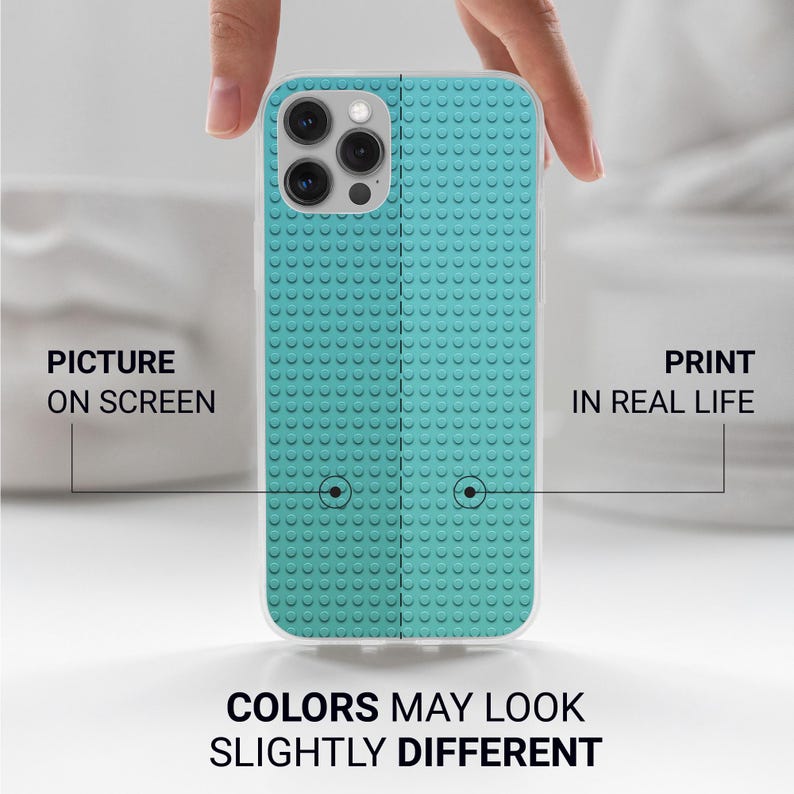 May include: A teal phone case with a textured design resembling interlocking toy bricks. The case has a clear border and a camera cutout. Text on the image reads "PICTURE ON SCREEN", "PRINT IN REAL LIFE", and "COLORS MAY LOOK SLIGHTLY DIFFERENT".