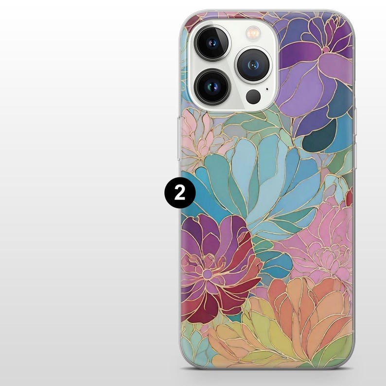 May include: A floral phone case featuring a vibrant design of colorful flowers in shades of purple, pink, blue, and orange, outlined with gold. The case has a clear border and a camera cutout.