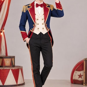 May include: A ringmaster costume featuring a navy blue tailcoat with red lapels, gold fringe epaulets, and brass buttons. It includes a cream double-breasted waistcoat, a red bow tie, a white collared shirt, black trousers with red side stripes, and a black top hat.
