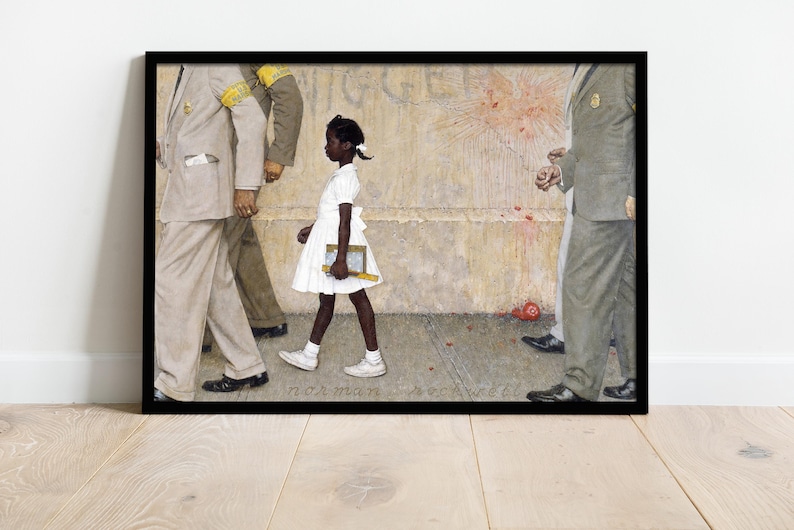 May include: Framed print of Norman Rockwell's painting, depicting a young Black girl in a white dress walking to school, escorted by U.S. Marshals. The artwork is set against a backdrop of a weathered wall and includes the artist's signature.