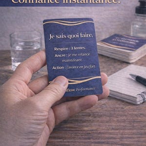 May include: A hand holds a navy blue card with white text in French. The card reads "Je sais quoi faire" and includes instructions for breathing and action. Other cards, a glass of water, and a notepad are in the background.