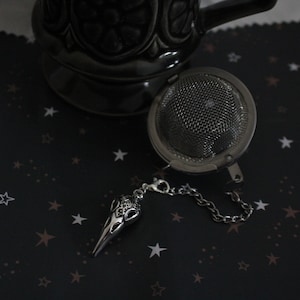 silver raven skull tea ball loose leaf infuser strainer, for the goth who also loves tea.