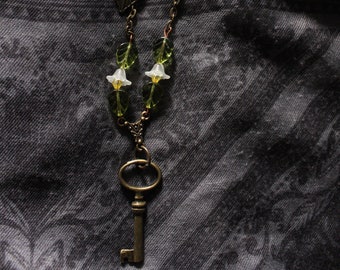 Brass leaf and key floral vintage style necklace