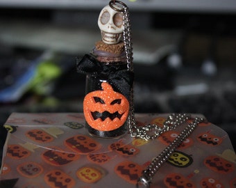 Halloween skull and jack o'lantern glitter bottle necklace