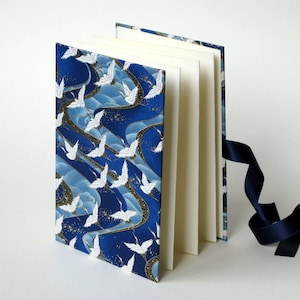 Livre photo LEPORELLO CHIYOGAMI Design « White Cranes »