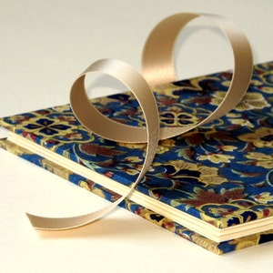 Livre photo LEPORELLO CHIYOGAMI Design « Rêve fleuri »
