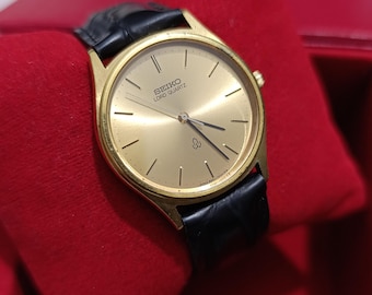 Vintage Seiko Lord Quartz 8241-7000 Golden Champagne Sunburst Dial 33MM 4J 8241A SEPT 1979 JDM