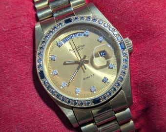 Vintage Roven Dino Quartz 2958 Day Date Golden Diamond Dial Diamond Bezel Mens Dress Watch