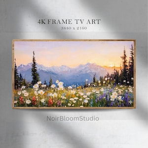 Puede incluir: Una pintura de paisaje enmarcada representa una cordillera bajo un cielo de atardecer. El primer plano presenta un campo de flores silvestres en tonos blancos, amarillos, rojos y morados. El texto "4K FRAME TV ART" y "3840 x 2160" es visible en la parte superior, y "NoirBloomStudio" en la inferior.