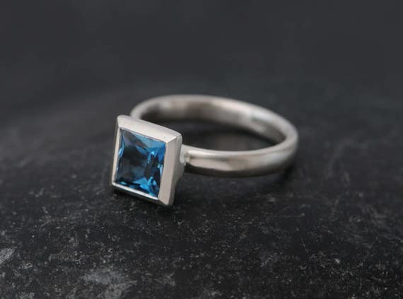 Princess cut topaz ring deals