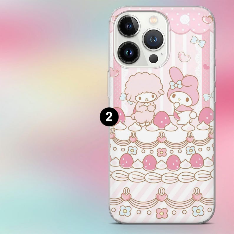 May include: Pink phone case featuring a cartoon design with two characters, bows, and hearts. The case has a layered design with pink and white stripes, strawberries, and floral accents. The number "2" is printed on the case.