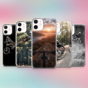 May include: A selection of phone cases showcasing mountain biking. The cases depict cyclists in action on trails, with dynamic images and vivid colours. The cases are clear with black and white and colour images.
