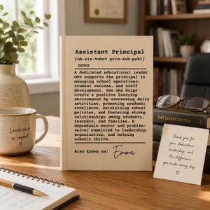 May include: A cream-colored rectangular plaque featuring black text that defines the noun Assistant Principal, including a phonetic pronunciation, a detailed description of the role, and the custom name Emma at the bottom under Also known as.