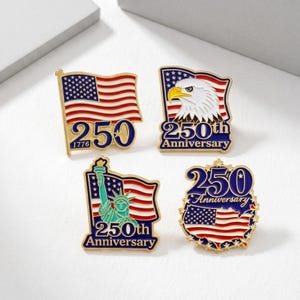 May include: Four patriotic pins with gold-colored borders. Each pin features the American flag, an eagle, the Statue of Liberty, or a map of the USA, along with the text "250th Anniversary". The pins are red, white, blue, and gold.