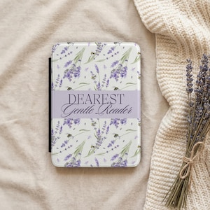 May include: A book cover featuring a lavender floral design and the text "DEAREST Gentle Reader" on a pale purple band. A bunch of dried lavender and a cream-coloured knitted blanket are next to the book.