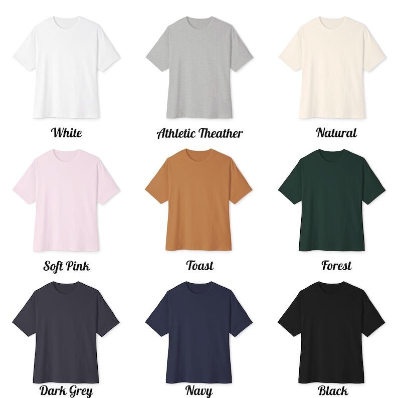May include: Nine short-sleeved t-shirts in a range of colours: white, grey, natural, pink, brown, green, dark grey, navy, and black. Each shirt is shown with its colour name below in a decorative font.