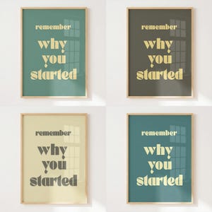 May include: Four rectangular wall art prints in light wooden frames, each featuring the text "remember why you started" in a bold serif font. The backgrounds are solid muted colors including teal, dark gray, cream, and blue-green.