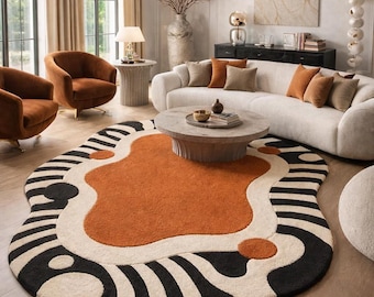 Alfombra moderna abstracta color naranja quemado – Alfombra contemporánea para sala de estar con diseño ondulado en crema y negro.