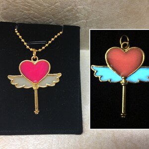 Winged HEART Wand GLOW in the DARK Pendant Necklace - Kawaii Gold Charm Magical Girl Magic Anime Manga Fantasy Cute Jewelry - Pink Blue