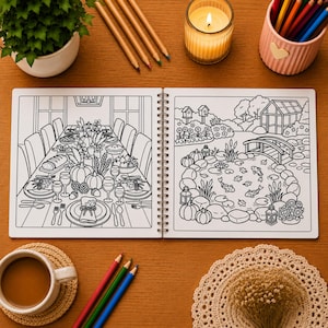 May include: A spiral-bound coloring book open to two pages featuring black and white line art. The left page shows a dining table set for a feast with pumpkins and place settings. The right page depicts a garden pond with koi fish and a bridge.