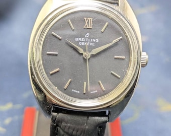 Reloj Breitling Geneve vintage de 17 rubíes, cuerda manual, fabricado en Suiza, para hombre, esfera negra.