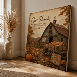Puede incluir: Un lienzo rectangular que muestra una escena de granero rústico con un carro de madera lleno de calabazas naranjas. El texto dice Give Thanks, For Family, For Home, For All Our Blessings y PUMPKINS HAYRIDES GRATEFUL HEARTS en letreros.