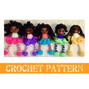 May include: Five crocheted dolls with black hair and colorful dresses. The dolls are wearing different colored dresses, including pink, purple, blue, green, and yellow. The dolls are all sitting on a white surface. CROCHET PATTERN is written in orange letters at the bottom of the image.