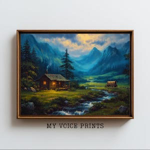 May include: A framed landscape painting depicts a cabin nestled in a valley with a flowing stream. Mountains rise in the background under a cloudy sky. The painting is framed in a brown wooden frame. Text at the bottom reads "MY VOICE PRINTS."