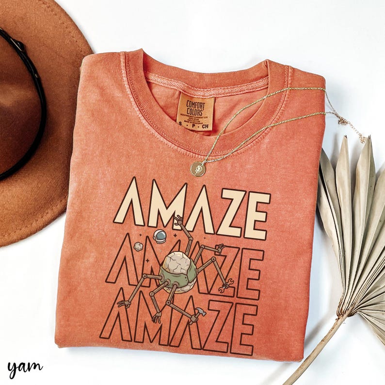 This Rocky inspired alien tee is made for readers who fell in love with one of the most unique friendships in modern science fiction. Whether you’re a dedicated Project Hail Mary fan or a general sci-fi nerd, this shirt is a fun conversation starter. Great for book clubs, science conventions, library events, or simply showing off your favorite space story.