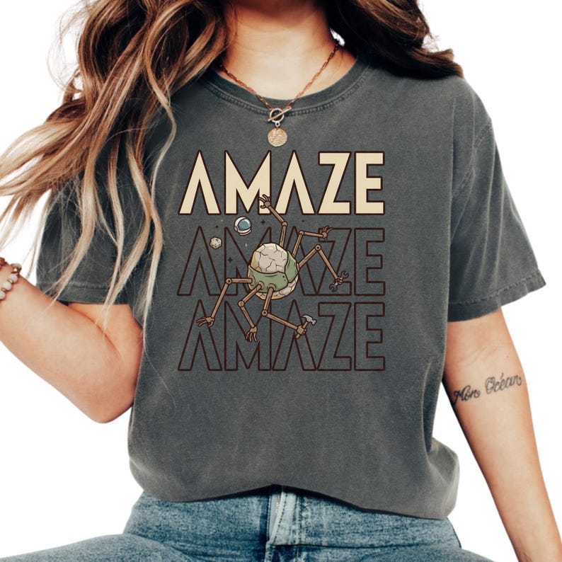 A must-have shirt for science fiction lovers, space nerds, and bookish readers who enjoy stories about survival, discovery, and friendship across the universe. The retro alien inspired design pairs perfectly with the relaxed Comfort Colors® aesthetic, giving you a stylish yet nerdy look that stands out at bookstores and conventions.