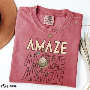 Whether you’re shopping for a sci-fi reader, a space enthusiast, or someone who devours science fiction novels, this shirt makes a thoughtful and fun gift. The design celebrates curiosity, problem solving, and the joy of discovering life beyond Earth—values every science fiction fan appreciates.