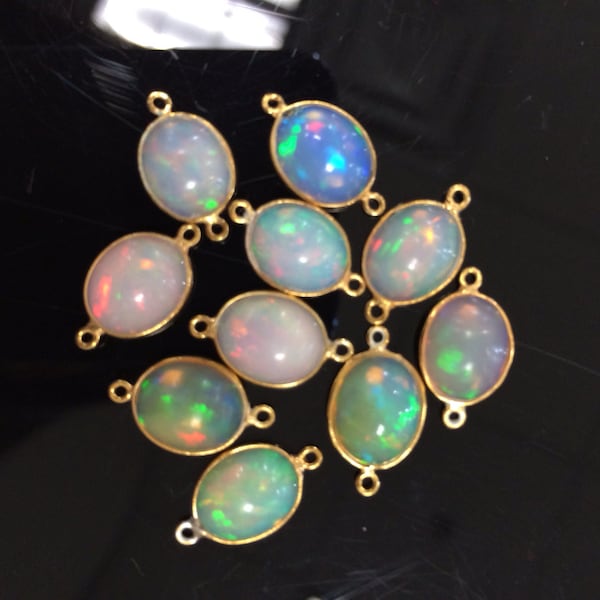 Ethiopian opal vermeil connector sold by piece size 6x8mm  no matching color
