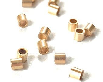 Koraliki zaciskowe wypełnione złotem 14k, 2 x 2 mm – Materiały do wyrobu biżuterii