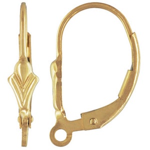 May include: Gold-tone earring findings with a decorative, pointed design. The findings have a hinged closure and a small loop at the bottom.