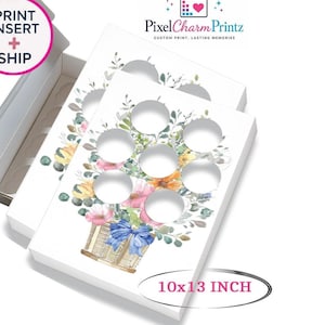 May include: Two white rectangular cardboard inserts for boxes, each measuring 10x13 inches. The inserts feature a watercolor illustration of a basket filled with pink, yellow, and orange flowers, green foliage, and a blue bow, with six circular cutouts.