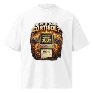 May include: White t-shirt with a graphic design. The design features the text "HOW'S YOUR CORTISOL?" above a stylized meter displaying "300%" and the phrase "HIT THE GYM BRO!" The design incorporates a fiery, distressed aesthetic.